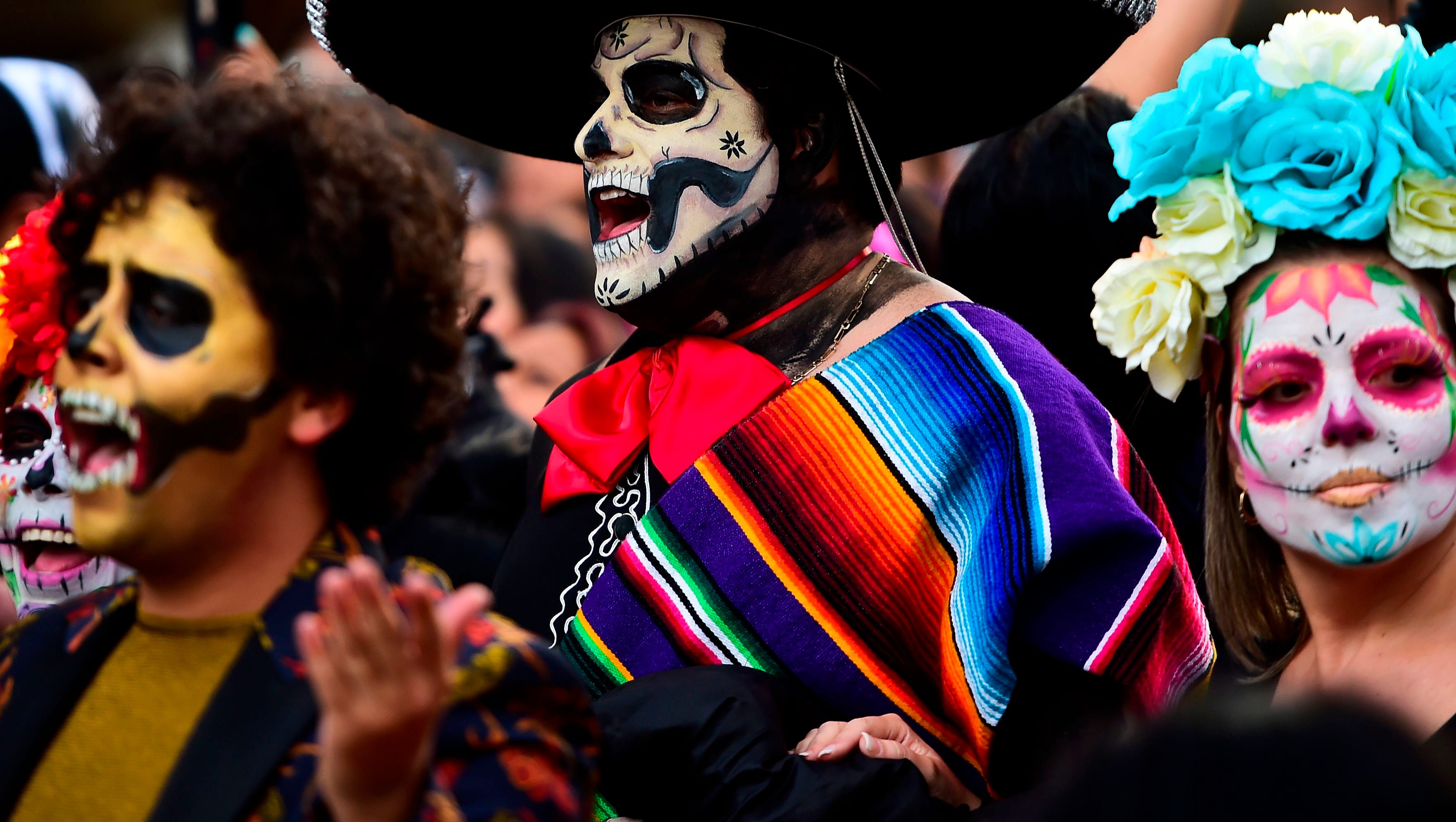 Dia dos Muertos, (https://www.gannett-cdn.com)